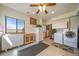 Bright laundry room with washer, dryer, and an expansive view at 12973 Mesa View Rd, Larkspur, CO 80118