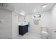 Bathroom features a modern vanity, walk-in shower and marble floors at 3529 N Garfield St, Denver, CO 80205