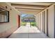 View of the covered carport leading to the backyard and home at 3529 N Garfield St, Denver, CO 80205