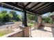 Covered front porch view with sturdy columns, brick detailing, and neighborhood street view at 3529 N Garfield St, Denver, CO 80205