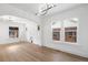 Spacious room with wood floors, lots of windows and an open floor plan at 3529 N Garfield St, Denver, CO 80205