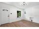 Inviting living room featuring wood floors, large windows, and a decorative fireplace nook at 3529 N Garfield St, Denver, CO 80205