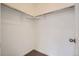 Spacious closet with double hanging rods and shelving at 14556 W 91St Ave # D, Arvada, CO 80005
