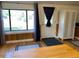 Entryway with wood floors, closet, and natural light at 8758 S Murphy Gulch Rd, Littleton, CO 80127