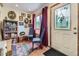 Inviting foyer featuring a decorative glass door, book case, and classic decor at 8758 S Murphy Gulch Rd, Littleton, CO 80127