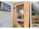 Home sauna with a glass door and wood construction, promising relaxation and wellness benefits at 8758 S Murphy Gulch Rd, Littleton, CO 80127