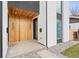Close-up of the front porch showcasing wood accents and modern design details at 3047 S Cherokee, Englewood, CO 80110