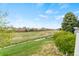 This is a view of a large green space behind the home; great for outdoor activities at 1461 S Danube Way # 104, Aurora, CO 80017