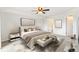 Serene main bedroom with plush carpeting, neutral decor, and a comfortable, inviting ambiance at 1461 S Danube Way # 104, Aurora, CO 80017