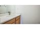 Modern bathroom vanity featuring quartz countertops, and wood cabinets with ample storage space at 510 Fairhaven St, Castle Rock, CO 80104