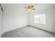 Bedroom with neutral carpet and a large window at 510 Fairhaven St, Castle Rock, CO 80104
