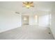 Bright and airy bedroom with ceiling fan, neutral carpet, and fresh paint at 510 Fairhaven St, Castle Rock, CO 80104