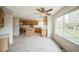 Open kitchen features stainless steel appliances, quartz countertops, center island, and an eat-in dining area at 510 Fairhaven St, Castle Rock, CO 80104