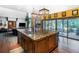 Open concept kitchen with a large island, granite countertops, and stainless steel appliances at 12570 W 60Th Ave, Arvada, CO 80004