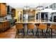 Spacious kitchen island with seating and stainless steel appliances at 12570 W 60Th Ave, Arvada, CO 80004
