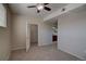 Bedroom boasts carpet, ceiling fan, and a convenient walk in closet at 1425 Blue Sky Cir # 15-107, Erie, CO 80516