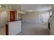 Open layout of kitchen, fireplace, and living space, great for entertaining at 1425 Blue Sky Cir # 15-107, Erie, CO 80516