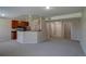 Spacious living room offering great sightlines to kitchen and entryways at 1425 Blue Sky Cir # 15-107, Erie, CO 80516