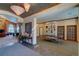 Inviting lounge area with a fireplace, ping pong table, and elegant decor, perfect for relaxation and recreation at 1425 Blue Sky Cir # 15-107, Erie, CO 80516