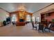 Spacious resident lounge with comfortable seating, a fireplace, and large windows providing ample natural light at 1425 Blue Sky Cir # 15-107, Erie, CO 80516
