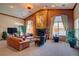 Inviting resident lounge area featuring a cozy fireplace, comfortable seating, and large windows for natural light at 1425 Blue Sky Cir # 15-107, Erie, CO 80516