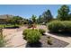 Neighborhood playground featuring colorful equipment, surrounded by trees and well-maintained landscaping at 1425 Blue Sky Cir # 15-107, Erie, CO 80516