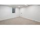 Neutral bedroom features neutral carpet, a window, white walls, and a closet at 8481 Clarkson St, Denver, CO 80229