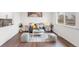 Cozy living room with stylish decor, hardwood floors, and plenty of natural light at 8481 Clarkson St, Denver, CO 80229