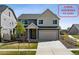 Charming two-story home with a two car garage, mature landscaping, and assumable VA loan at 5352 Truckee St, Denver, CO 80249
