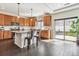 Modern kitchen with granite countertops, a large island and stainless steel appliances at 5352 Truckee St, Denver, CO 80249