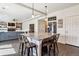 Open concept kitchen featuring granite countertops, a large island, and stainless steel appliances at 5352 Truckee St, Denver, CO 80249