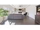Inviting living room featuring built-in bookshelves, modern ceiling fan and hardwood floors at 5352 Truckee St, Denver, CO 80249
