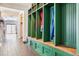 Functional mudroom showcasing built-in storage lockers and drawers, perfect for organization at 5352 Truckee St, Denver, CO 80249