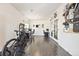 A home office with wood-look tile, dual workstations, and natural light at 5352 Truckee St, Denver, CO 80249