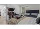 Bedroom featuring multiple beds, window and closet, creating comfortable private space at 9185 Wilde Ln # 101, Parker, CO 80134