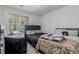 Bedroom featuring multiple beds, window and closet, creating comfortable private space at 9185 Wilde Ln # 101, Parker, CO 80134