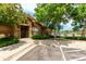 Community clubhouse exterior with lush landscaping and convenient parking, near a refreshing pool at 9185 Wilde Ln # 101, Parker, CO 80134