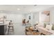 Open basement layout with a dining area and living space, perfect for entertaining at 5944 E Irwin Pl, Centennial, CO 80112