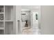 Spa-like bathroom featuring white tile, soaking tub, and modern fixtures in a well-lit space at 5944 E Irwin Pl, Centennial, CO 80112