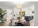 Open floor plan view from dining room to living room and kitchen area at 5944 E Irwin Pl, Centennial, CO 80112