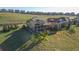 Backyard view of multi-tiered decks, lush green hillside and neighborhood at 17102 W 85Th Pl, Arvada, CO 80007