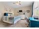 Comfortable bedroom with neutral tones, plush carpet, and great natural light at 17102 W 85Th Pl, Arvada, CO 80007