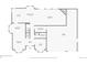Floor plan of first floor with kitchen, living room, dining room, sitting room, bathroom, and garage at 6656 S Oak Cir, Littleton, CO 80127