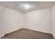 Cozy bedroom features neutral carpet, a closet, and a minimalist design at 8105 W 62Nd Ave, Arvada, CO 80004