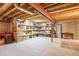 A basement workshop with lots of storage shelves and a desk at 1465 Arabian Trl, Elizabeth, CO 80107