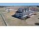 Lovely two-story home with a charming covered porch and ample yard space in a tranquil setting at 1465 Arabian Trl, Elizabeth, CO 80107