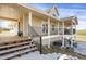 Beautiful home with a large porch and deck and a hot tub at 1465 Arabian Trl, Elizabeth, CO 80107