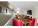 Comfortable living room featuring cozy seating, TV, and a rustic coffee table at 1465 Arabian Trl, Elizabeth, CO 80107