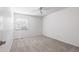 Light-filled bedroom with a large window, grey carpet, neutral walls, and lots of space at 3274 S Heather Gardens Way, Aurora, CO 80014