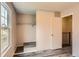 Bedroom featuring a closet, a window, and neutral wall color at 9467 W Ontario Dr, Littleton, CO 80128